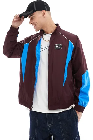 Nike Chaqueta de chándal y azul con logo de tejido liso de Air