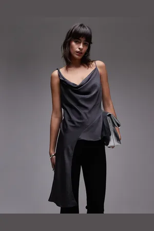 MANGO Top asimétrico con caída y acabado sedoso de