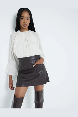 River Island Minifalda con bolsillo de parche de cuero sintético de