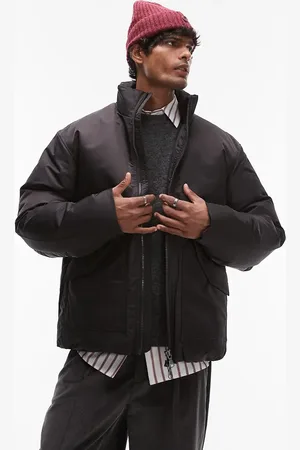 ARKET Chaqueta negra acolchada con cremallera y bolsillos con solapa de