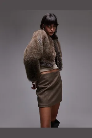 MANGO Chaqueta corta de mezcla de piel sintética de