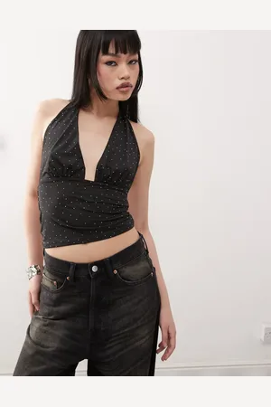 COLLUSION Top largo ceñido con cuello halter y diseño de tachuelas de