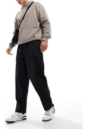 Another Influence Pantalones cargo negros de estilo paracaidista y pernera ancha de
