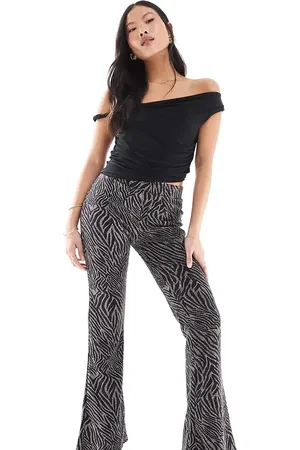 ONLY Pantalones de campana negros con acabado de purpurina de