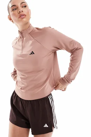 adidas Prenda de playa roja con cremallera corta y diseño minimalista Essentials de adidas Training-Rojo