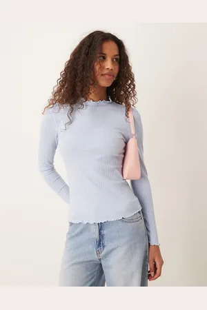 JDY Top con cuello alto y bordes ondulados de