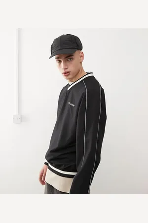 COLLUSION Sudadera negra con cuello de pico de nailon de