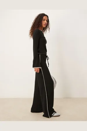 ASOS Pantalones negros de pernera ancha con detalle de ribetes y acabado cepillado de