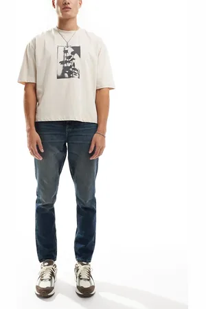 ASOS Vaqueros de corte slim con lavado oscuro tintado de -Azul