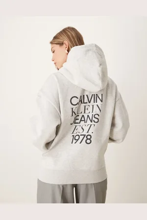 Calvin Klein Sudadera gris holgada con capucha y estampado trasero de