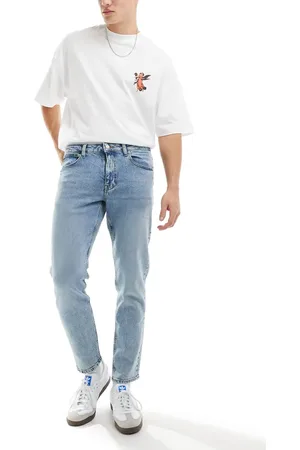 ASOS Vaqueros tapered azul claro lavado de corte elástico de