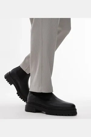 Tommy Hilfiger Botines Chelsea negros con suela gruesa de cuero de