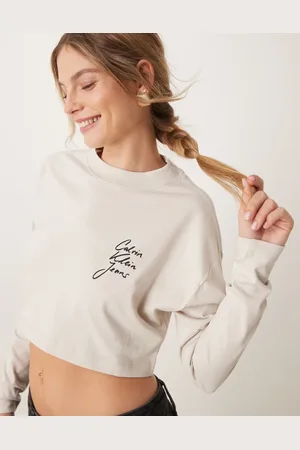 Calvin Klein Camiseta corta beis de manga larga con logo de texto de -Neutro