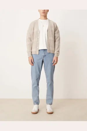 ASOS Vaqueros azules de corte tapered con lavado medio de