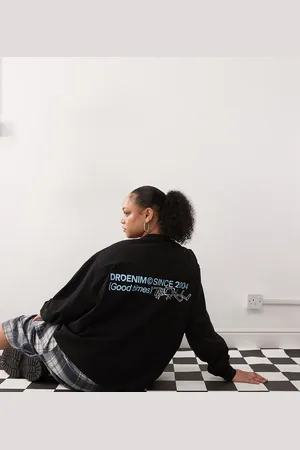 Dr Denim Camiseta negra holgada de manga larga con estampado gráfico azul de