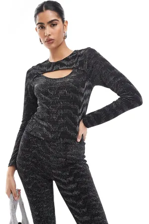VERO MODA Top negro y plateado de manga larga con abertura y acabado de purpurina de (parte de un conjunto)