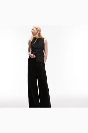 Topshop Pantalones negros de pernera ancha con cinturilla estrecha de terciopelo rugoso de