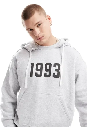 Cotton On Sudadera gris jaspeado de corte cuadrado con capucha y estampado "1993" de Cotton On