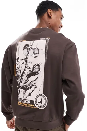 ASOS Sudadera marrón extragrande con estampado fotográfico de pájaro en la espalda de