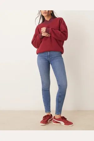 Gina Tricot Vaqueros elásticos de talle alto y corte superpitillo con lavado azul medio Molly de