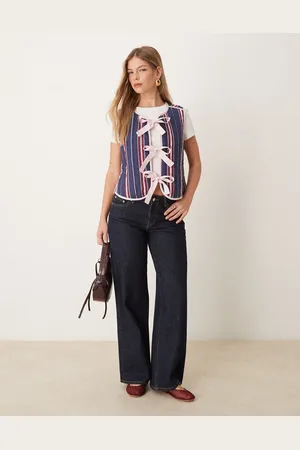 Gina Tricot Vaqueros de talle bajo y pernera ancha con lavado azul añil enjuagado de