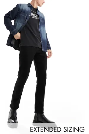 ASOS Vaqueros negros de corte slim elástico de