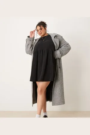 ASOS Vestido corto amplio estilo camiseta con detalle de costura en la cintura de pana de ASOS DESIGN Curve