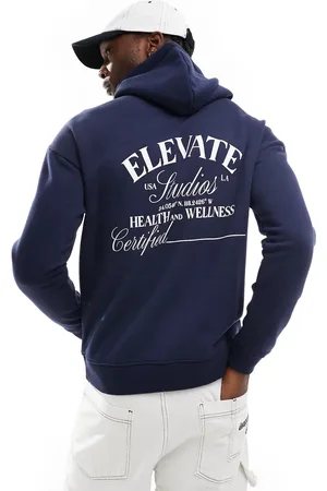 Another Influence Sudadera extragrande con capucha y texto "Elevate" de