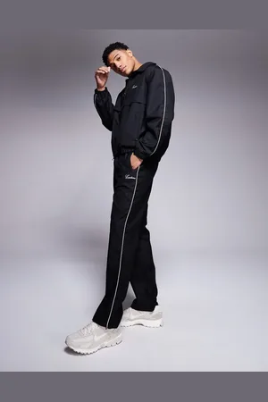 The Couture Club Joggers de chándal negros de estilo formal con ribetes de (parte de un conjunto)