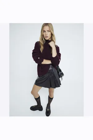 River Island Minifalda de cuero sintético efecto desgastado de