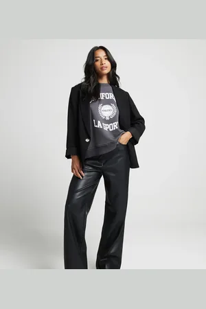River Island Pantalones negros de pernera recta de cuero sintético de