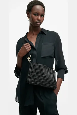 AllSaints Bandolera negra con tachuelas Eve de