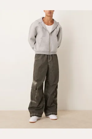 ASOS Pantalones cargo negros muy holgados con lavado desgastado de
