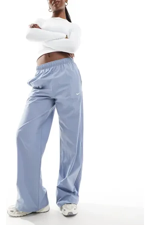 Nike Pantalones azules de pernera ancha y talle alto Trend Street de