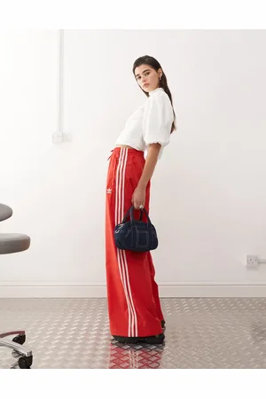 adidas Pantalones de chándal rojos de pernera ancha Adicolor de