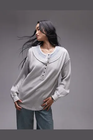 Free People Sudadera gris jaspeado holgada con detalle de pespuntes y cuello panadero de punto gofrado de