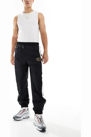Nike Joggers negros y blancos Swoosh Air de