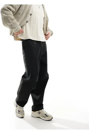 River Island Pantalones cargo negros de pernera ancha de