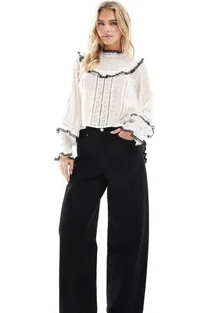 Miss Selfridge Vaqueros lavado holgados con bolsillos en forma de corazón y bordado inglés de