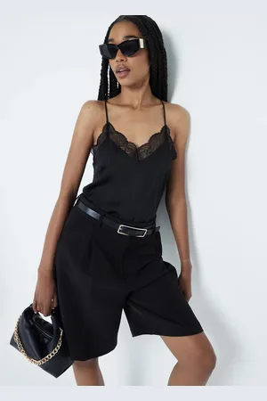 River Island Top de tirantes con ribetes de encaje de