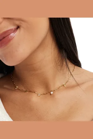 Accessorize Collar con charms celestiales y letra E chapado en oro de la colección Z de
