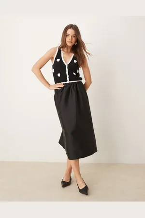 Gina Tricot Falda midi negra de corte amplio con bajo abullonado voluminoso de