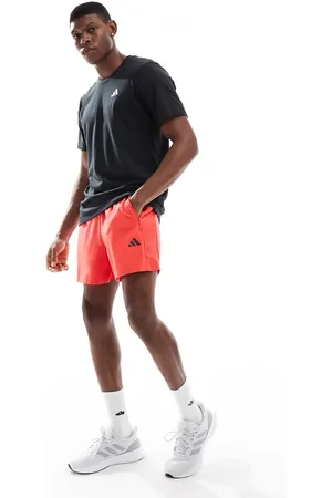 adidas Pantalones cortos rojos Essentials de adidas Training