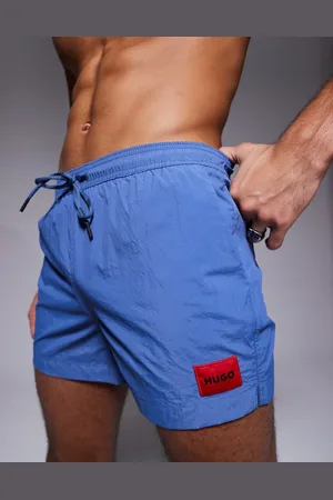 HUGO BOSS Shorts de baño azules con etiqueta roja del logo Dominica de HUGO