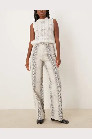 New Look Vaqueros de pernera ancha con estampado de serpiente de -Blanco