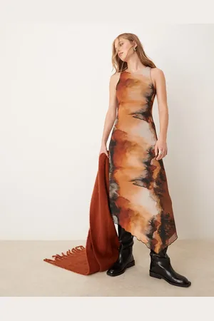 New Look Vestido midi naranja con bajo asimétrico y diseño estampado de malla de