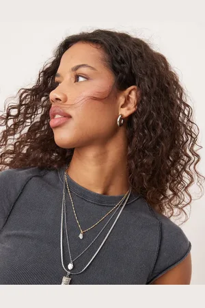 Free People Camiseta lavado con diseño encogido y mangas raglán de canalé de