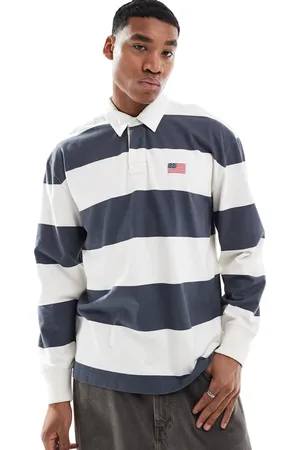 Hollister Top azul marino a rayas en relieve de estilo rugby con logo universitario de