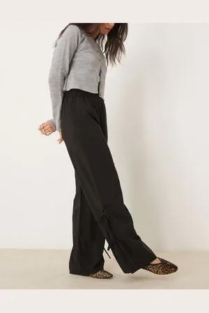 VILA Pantalones negros de pernera ancha con detalle de lazadas y abertura en el lateral de