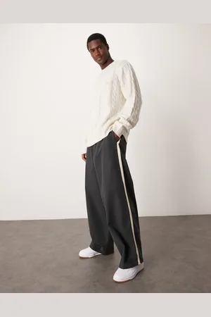 ASOS Pantalones gris carbón de corte globo holgado con raya en el lateral de
